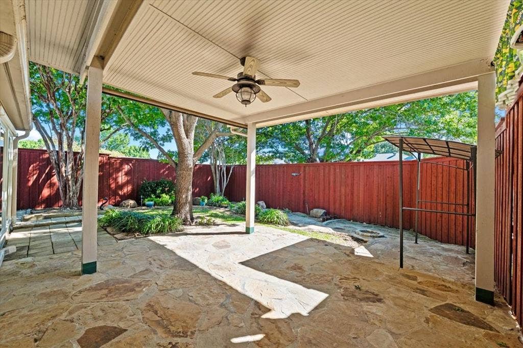 1508 Heidi Drive, Plano, TX 75025 Covered patio- flagstone walkways throughout the garden - year around perennials landscaping - additional covered area for relaxation - all of this is viewed from the sunroom