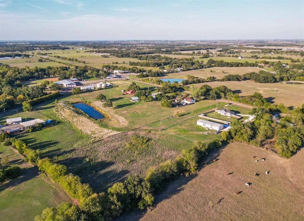 3659 N Katy Road, Ross, TX 76640 Expansive rural acreage featuring open pasture land, multiple ponds, and mature tree clusters
