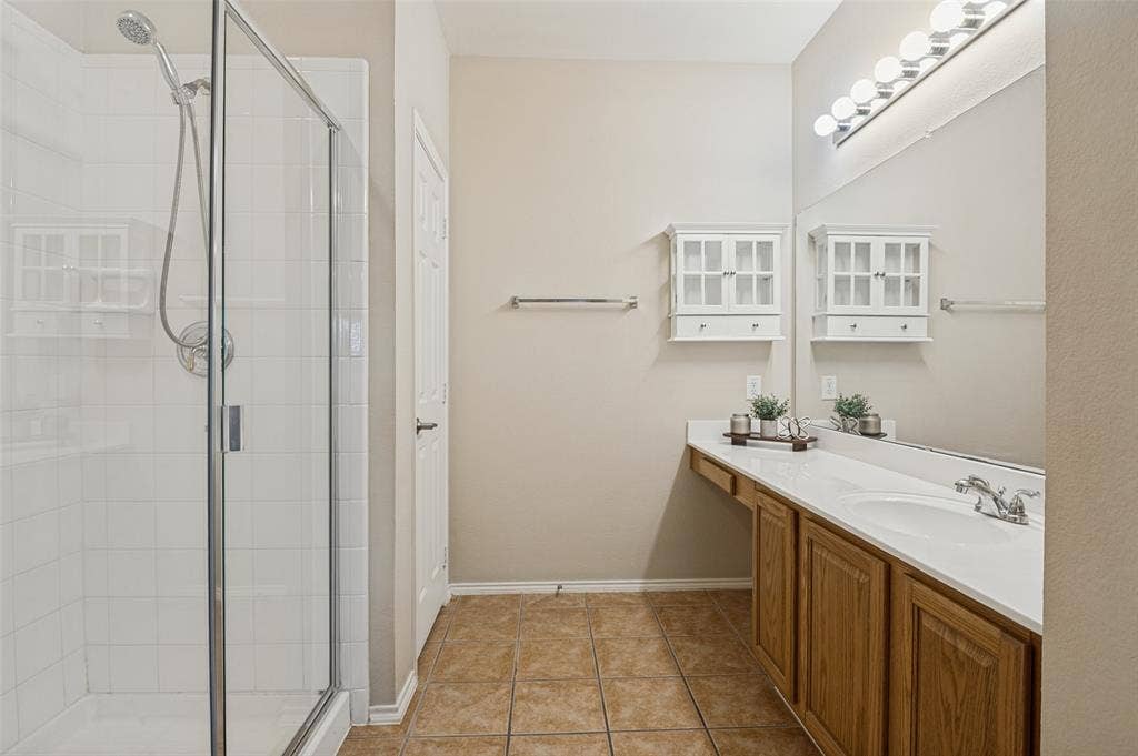 7225 Rembrandt Drive, Plano, TX 75093 primary bath with walk in shower