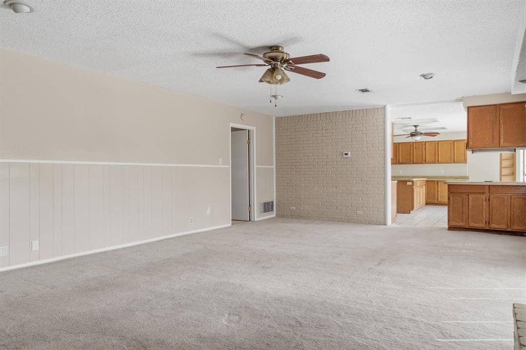 2729 Tanglewood Drive, Commerce, TX 75428 Entry to front room that can be a 4th bedroom or another living area. Open up this wall to make it an even bigger space for gatherings and fun.