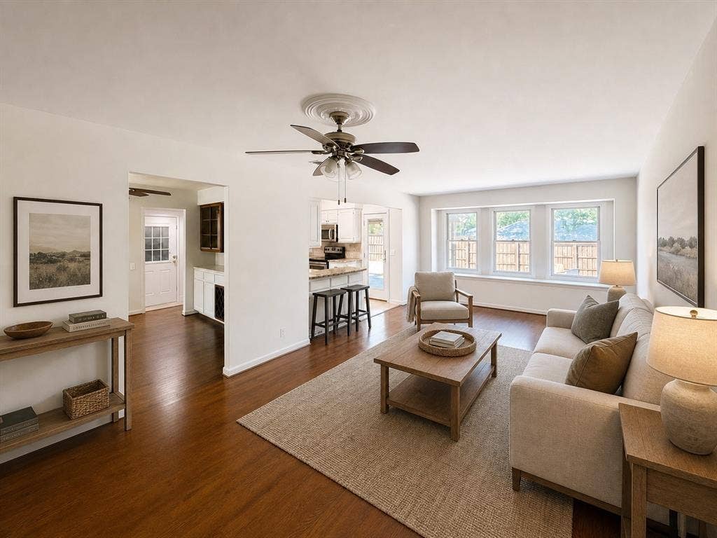 3210 Cortez Court W, Irving, TX 75062 Living area featuring wood-finish flooring, a ceiling fan with decorative medallion, and multiple windows