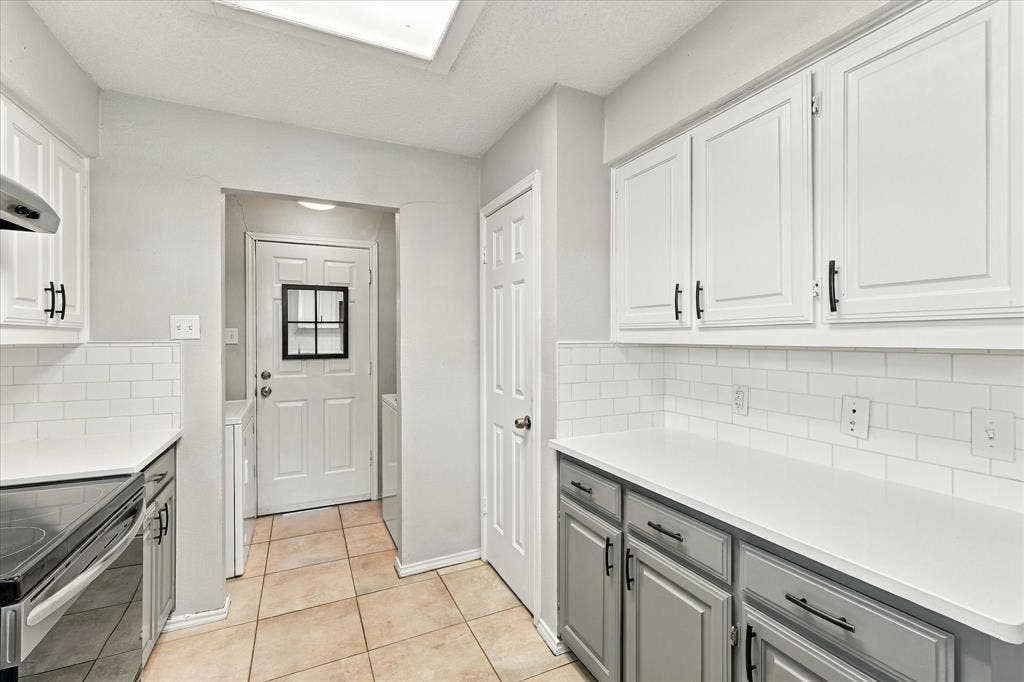 2315 Highridge Drive, Sachse, TX 75048 Kitchen has stainless steel appliances