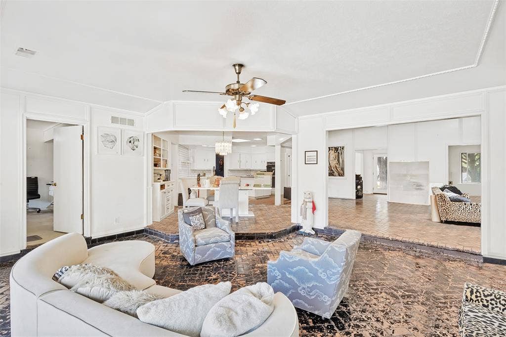 7257 Stefani Drive, Dallas, TX 75225 View of Sun Room looking towards Kitchen/Breakfast Room and Den.
