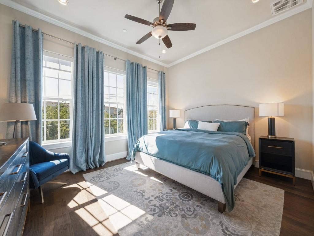 7333 Valley View Lane, #805, Dallas, TX 75240 Light Spills in Through the Windows into the Primary Bedroom Creating A Special, Peaceful Space to Relax.