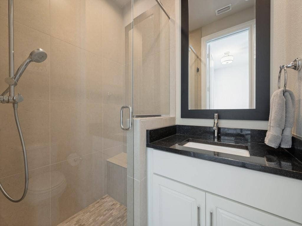 7333 Valley View Lane, #805, Dallas, TX 75240 The Second Bedroom Features a Private Bath with Walk-in Shower.