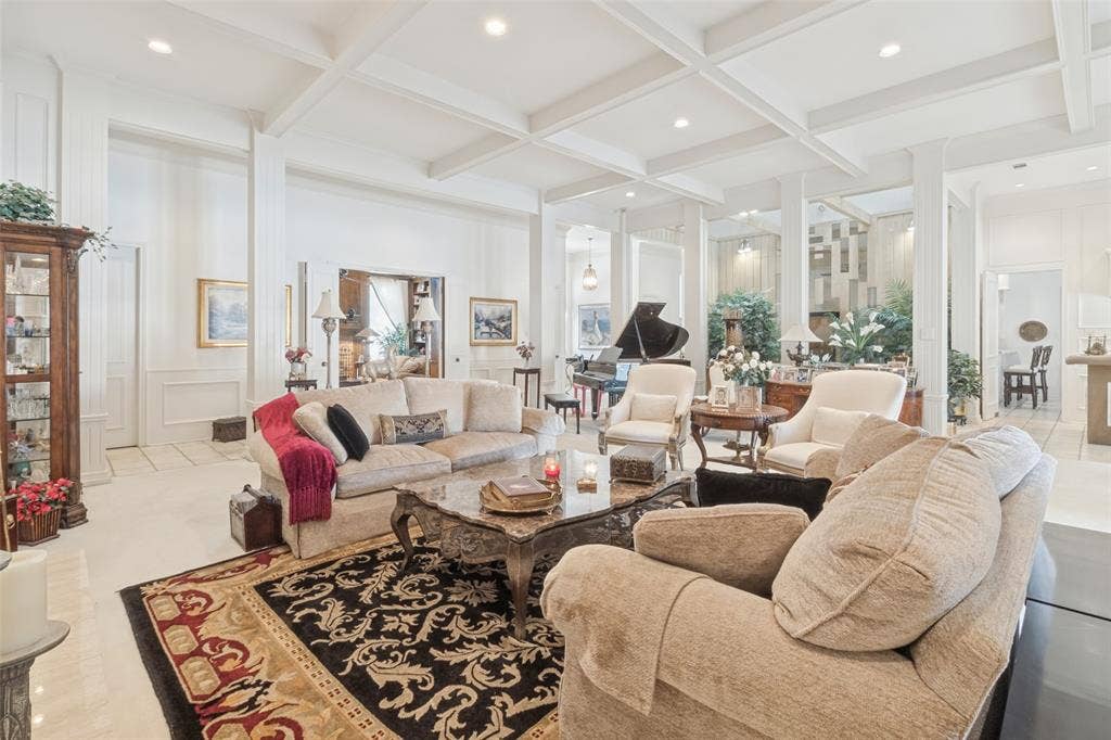 6215 Raintree Court, Dallas, TX 75254 Coffered ceiling with recessed lighting, wainscoting, and polished stone flooring