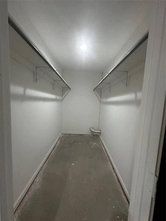 4808 Sandra Lynn Drive, Mesquite, TX 75150 Reach-in closet featuring dual-sided metal shelving and hanging rods