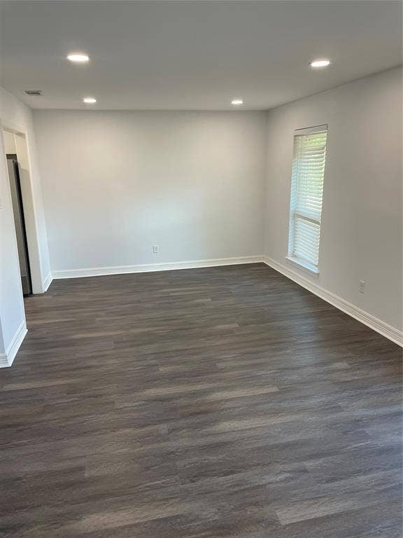 1423 Northridge Drive, Carrollton, TX 75006 Interior space featuring wood-finish flooring, recessed lighting, and a single window with fitted blinds