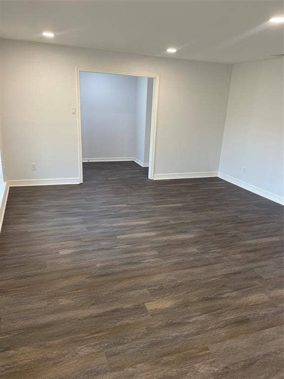 1423 Northridge Drive, Carrollton, TX 75006 Neutral wall tones, wood-finish flooring, and recessed ceiling lighting
