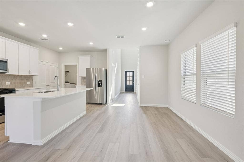 110 Decoursey Drive, Princeton, TX 75071 Photo is not of the actual home, but is an inspirational photo of builder’s model home and may depict options, furnishings, and/or decorator features that are not included.