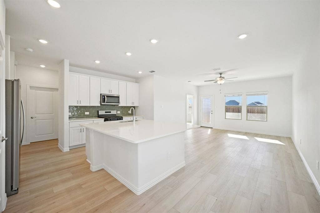 104 Decoursey Drive, Princeton, TX 75071 Photo is not of the actual home, but is an inspirational photo of builder’s model home and may depict options, furnishings, and/or decorator features that are not included.