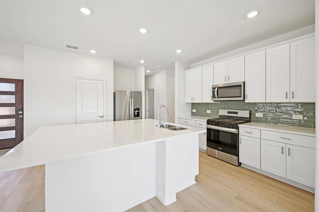 104 Decoursey Drive, Princeton, TX 75071 Photo is not of the actual home, but is an inspirational photo of builder’s model home and may depict options, furnishings, and/or decorator features that are not included.