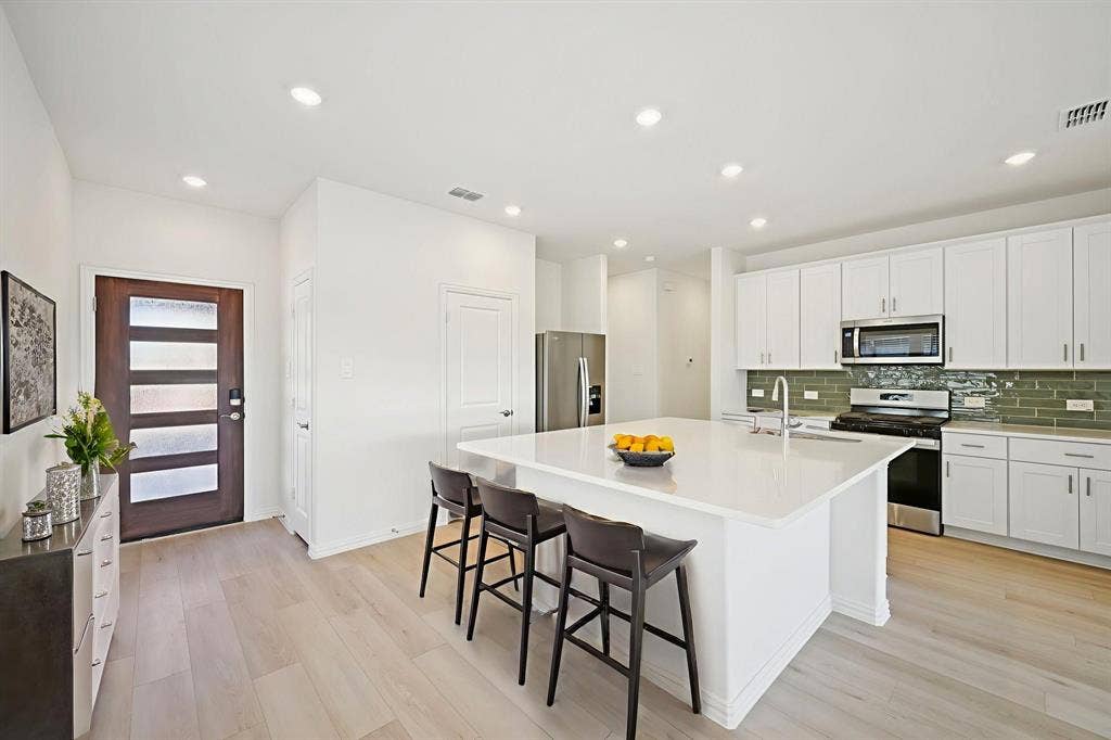 104 Decoursey Drive, Princeton, TX 75071 Photo is not of the actual home, but is an inspirational photo of builder’s model home and may depict options, furnishings, and/or decorator features that are not included.