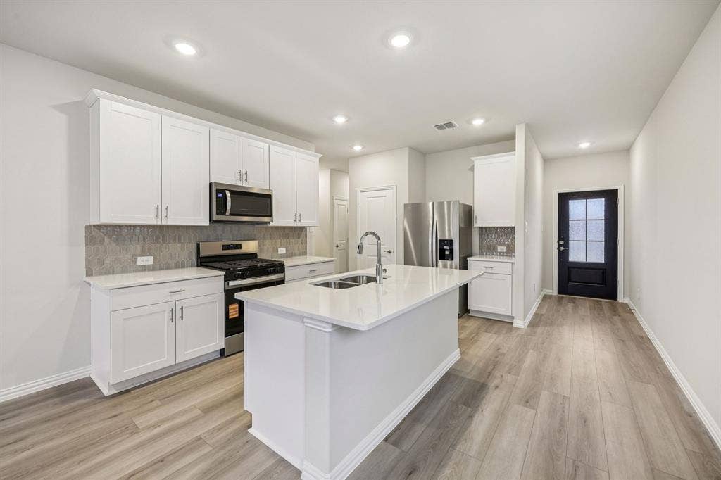 102 Decoursey Drive, Princeton, TX 75071 Photo is not of the actual home, but is an inspirational photo of builder’s model home and may depict options, furnishings, and/or decorator features that are not included.