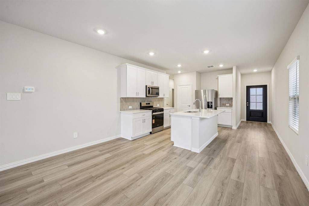 102 Decoursey Drive, Princeton, TX 75071 Photo is not of the actual home, but is an inspirational photo of builder’s model home and may depict options, furnishings, and/or decorator features that are not included.
