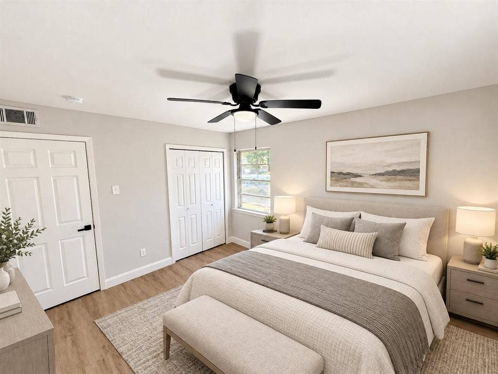 1307 Crestridge Drive, Plano, TX 75075 Wood-finish flooring, neutral wall tones, multi-panel doors, closet with bifold doors, and a ceiling fan with integrated lighting