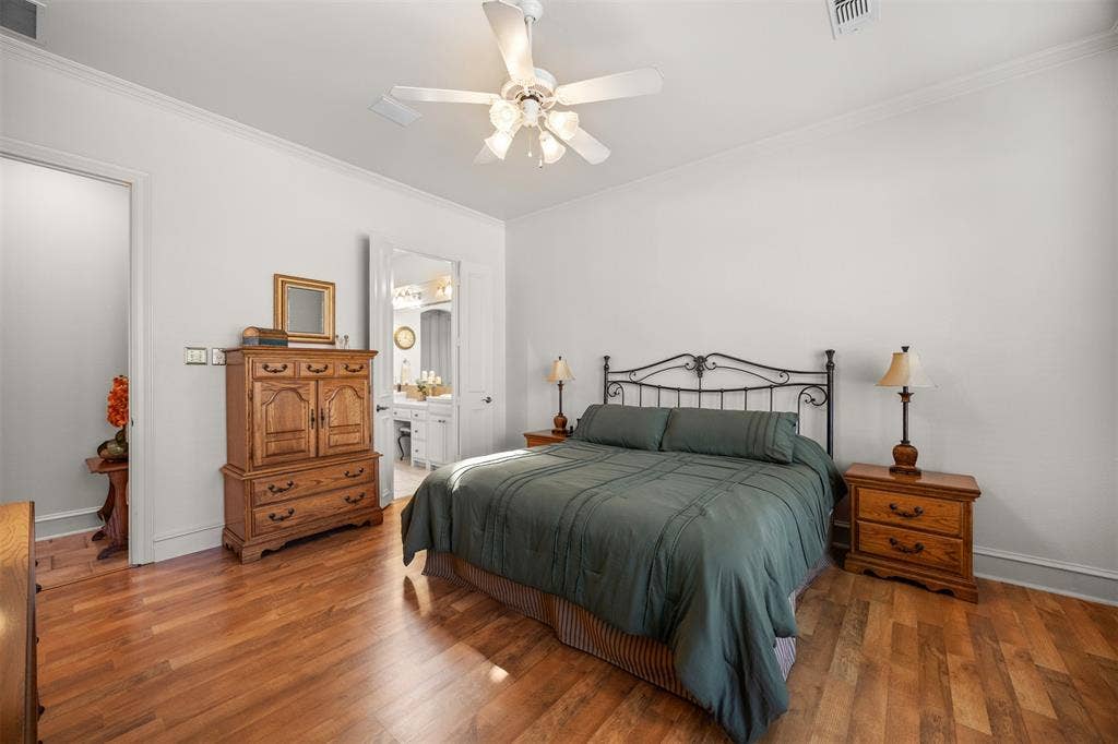 1516 Hackett Creek Drive, McKinney, TX 75072 Step into your primary suite where relaxation and privacy await.