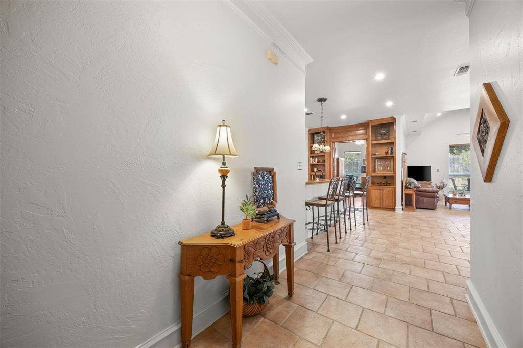 1516 Hackett Creek Drive, McKinney, TX 75072 Step in and see the open space for gathering.