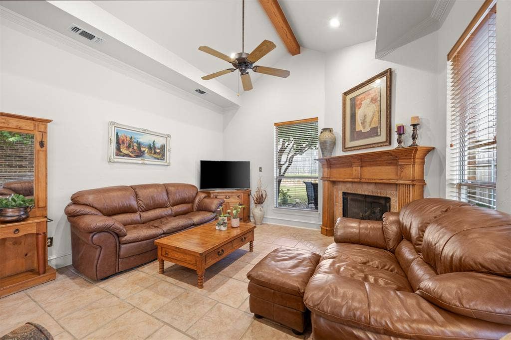 1516 Hackett Creek Drive, McKinney, TX 75072 The fireplace is ready to keep you warm on the chilling TX evenings.