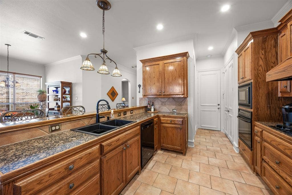 1516 Hackett Creek Drive, McKinney, TX 75072 Open kitchen is ready for your favorite meals.