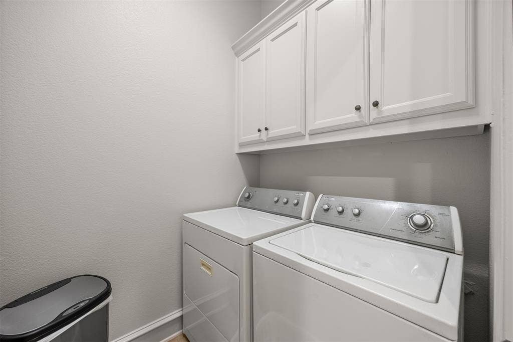 1516 Hackett Creek Drive, McKinney, TX 75072 Laundry room is located off the kitchen.