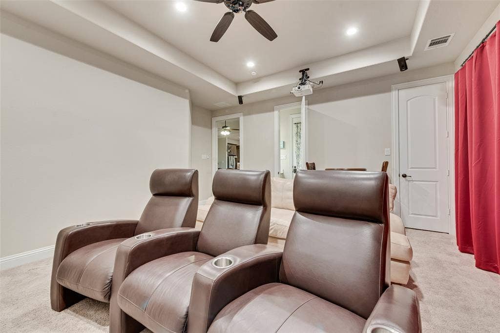 7231 Judy Drive, Ovilla, TX 75154 Tray ceiling with recessed lighting, integrated ceiling fan, and ceiling-mounted projector