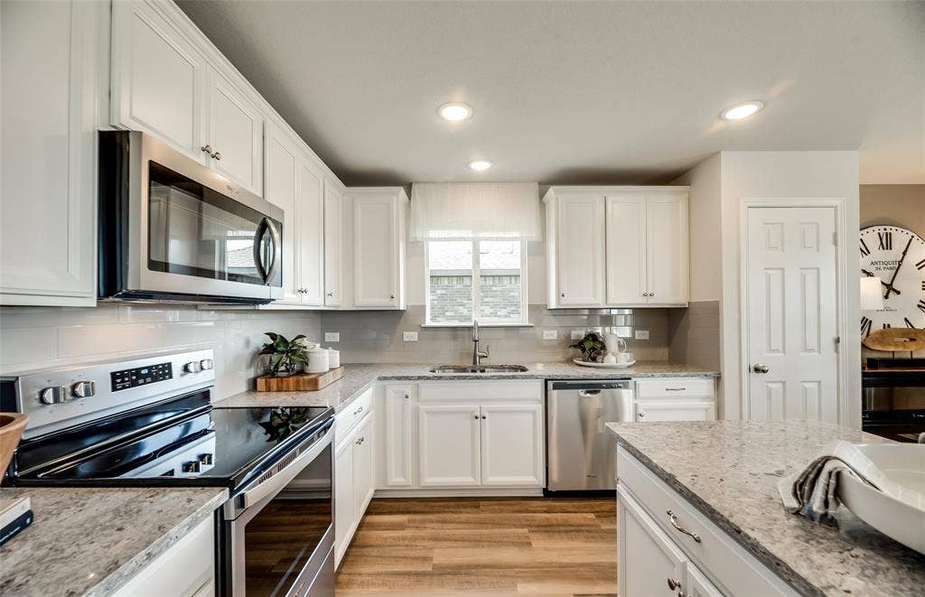 1054 Clear Dusk Lane, Forney, TX 75126 *Model Representation - Abundant cabinet space in kitchen