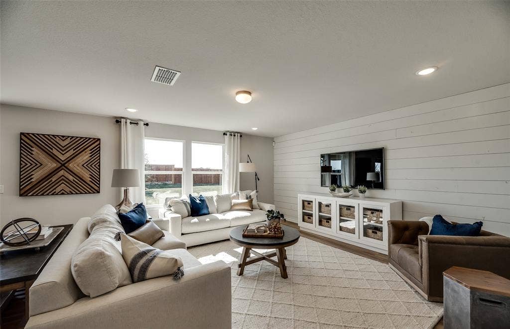 1054 Clear Dusk Lane, Forney, TX 75126 *Model Representation - Spacious gathering room with large windows