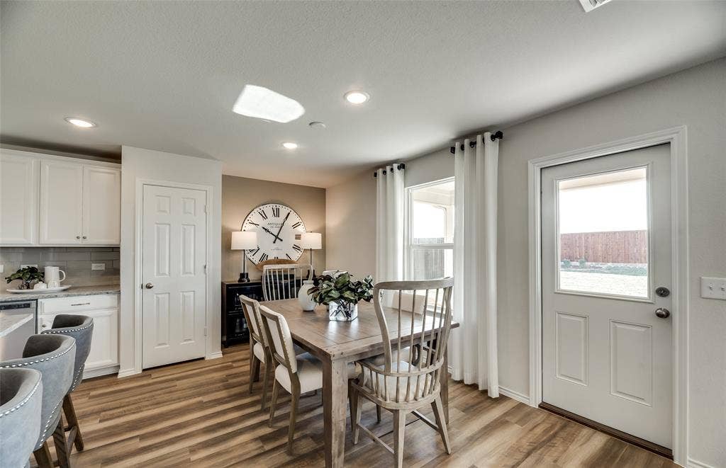 1054 Clear Dusk Lane, Forney, TX 75126 *Model Representation - Dining area off kitchen with large windows