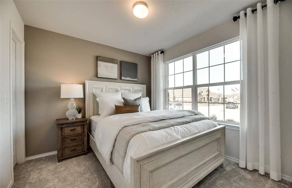 1054 Clear Dusk Lane, Forney, TX 75126 *Model Representation - Spacious secondary bedroom with large windows