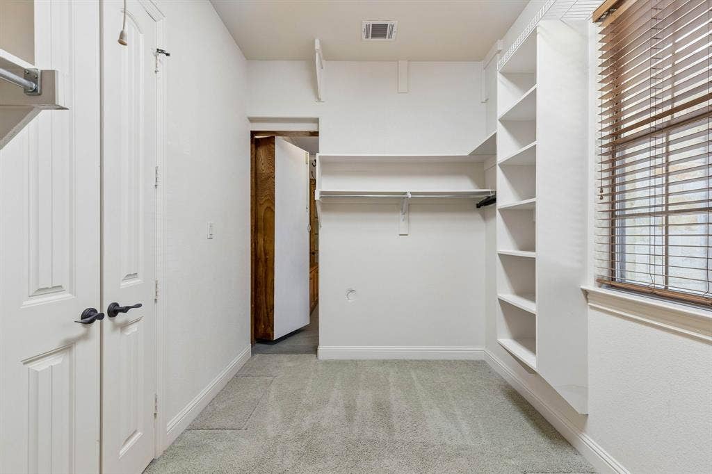 186 Moonlight Drive, Murphy, TX 75094 Secret door from office leads to primary closet