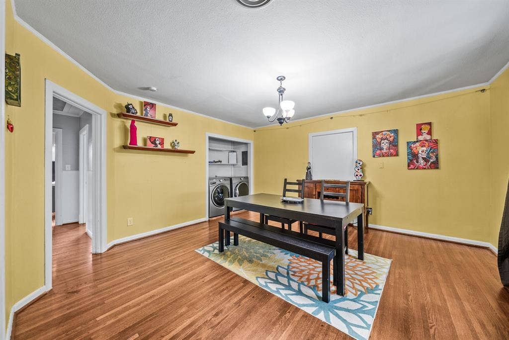 2807 Cain Boulevard, Dallas, TX 75211 Wood-finish flooring throughout, with a recessed laundry area