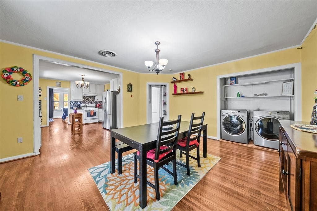 2807 Cain Boulevard, Dallas, TX 75211 Hardwood-finish flooring throughout, with a recessed laundry area featuring shelving