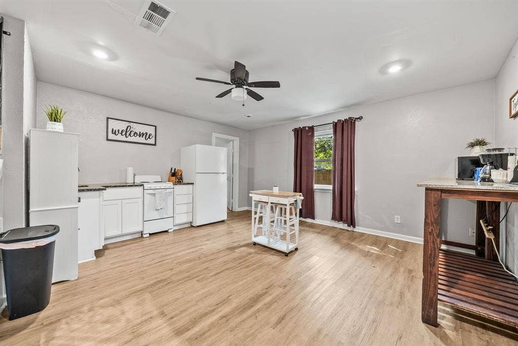 2807 Cain Boulevard, Dallas, TX 75211 Wood-finish flooring throughout, recessed lighting, and a ceiling fan
