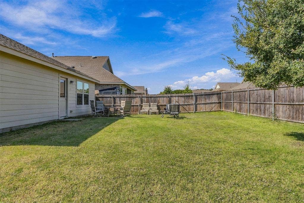 1516 Stonefield Drive, Anna, TX 75409 A look at the home's backyard and outdoor living space.