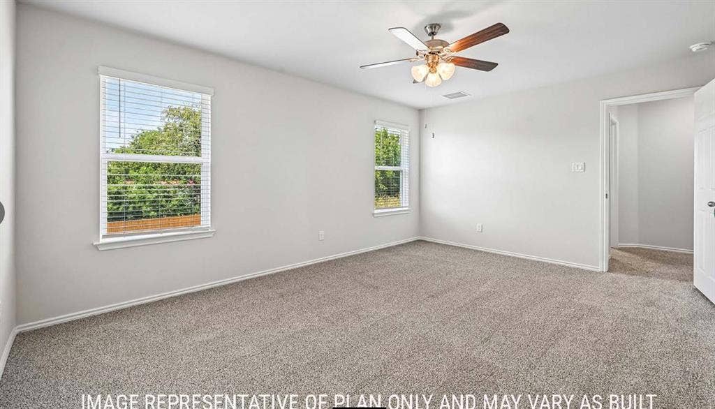 11813 Ceres Street, Lorena, TX 76655 Neutral-toned carpeting, dual windows with horizontal blinds, and a ceiling-mounted light fixture with a fan