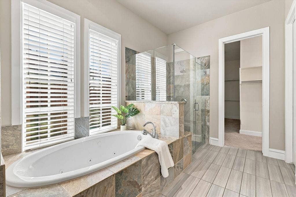 6200 Corsica Way, Plano, TX 75024 Spa-like primary bathroom with jetted tub and walk-in shower with frameless glass