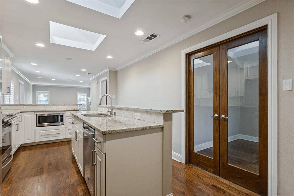 6507 Starling Circle, Dallas, TX 75209 Kitchen showing access to 3rd bedroom or office