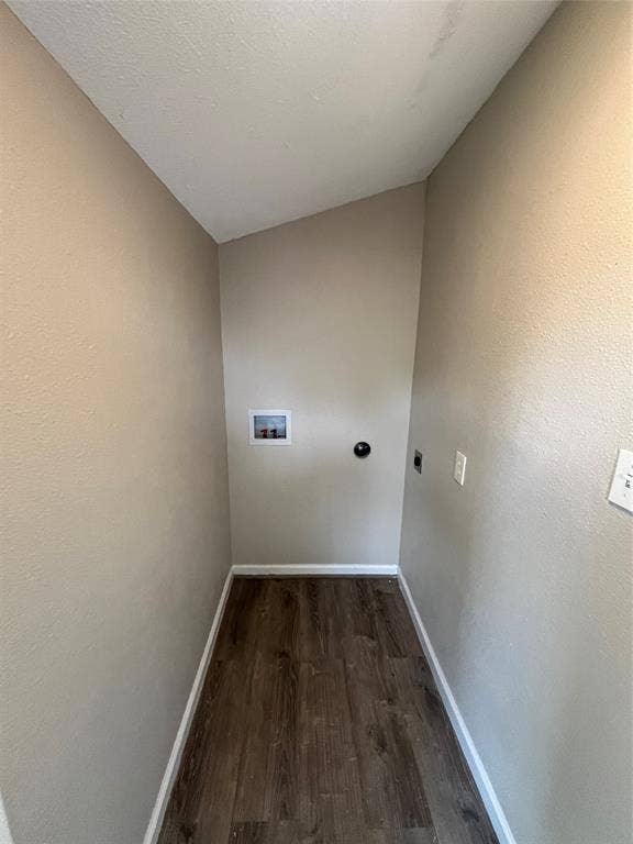6415 Godfrey Avenue, Dallas, TX 75217 Enclosed alcove featuring wood-finish flooring and integrated utility connections