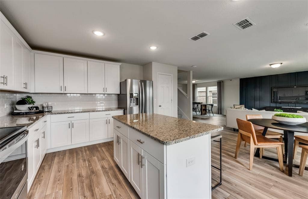 1056 Clear Dusk Lane, Forney, TX 75126 *Model Representation - Abundant cabinet space in kitchen