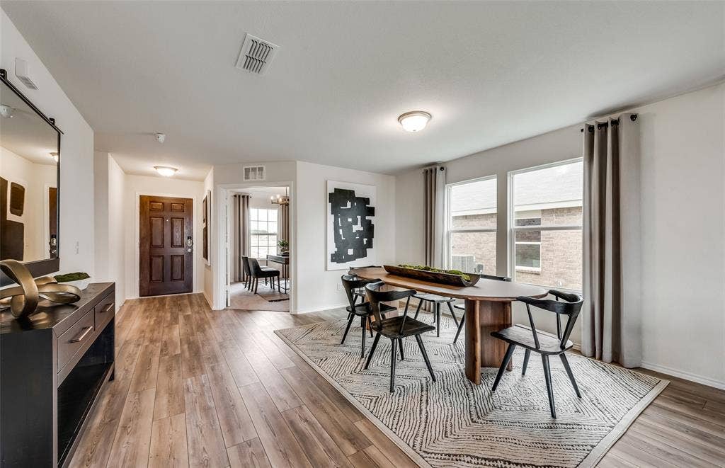 1056 Clear Dusk Lane, Forney, TX 75126 *Model Representation - Dining area off kitchen with large windows
