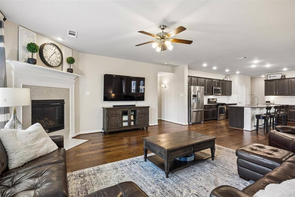 1321 Meridian Drive, Forney, TX 75126 Here you can see the corner fireplace and large living space.