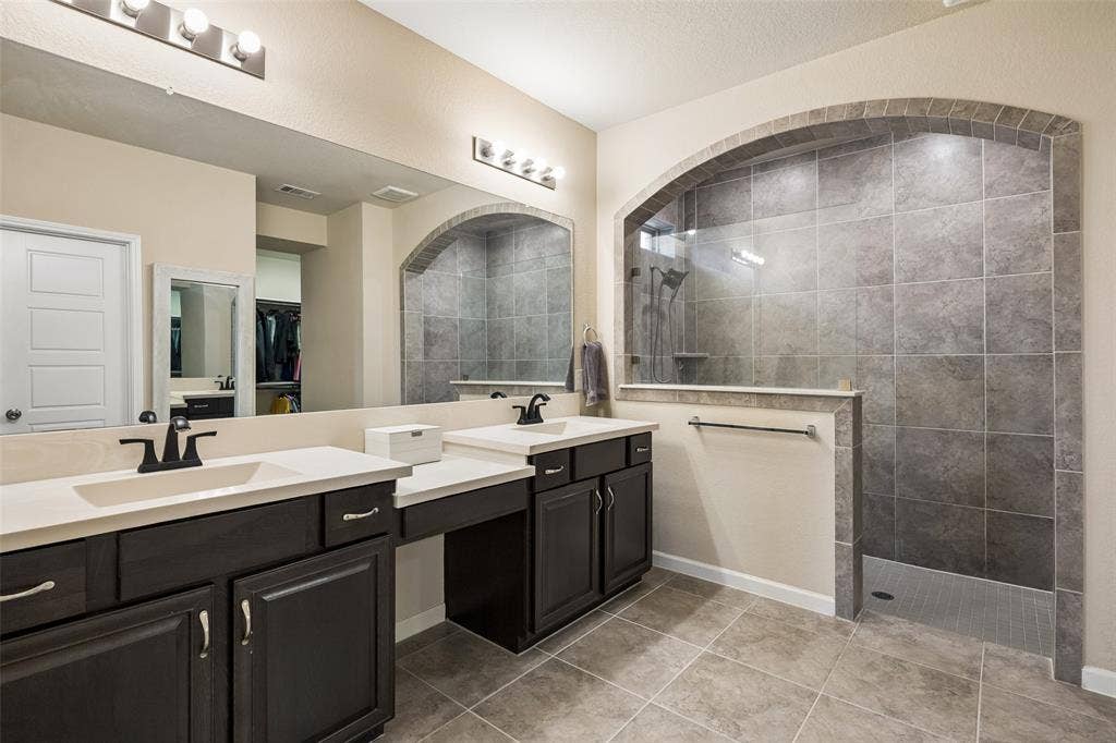 1321 Meridian Drive, Forney, TX 75126 The ensuite praimary bathroom features an oversized walk in shower.