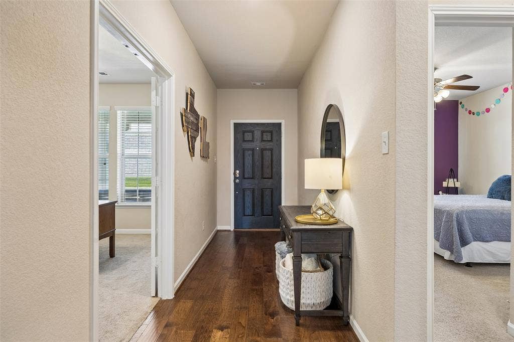 1321 Meridian Drive, Forney, TX 75126 Looking towards the front entry you can see the office on the left and the downstairs bedroom on the right.
