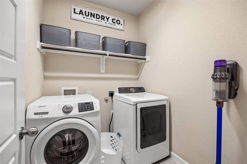 1321 Meridian Drive, Forney, TX 75126 Laundry space featuring open storage shelves