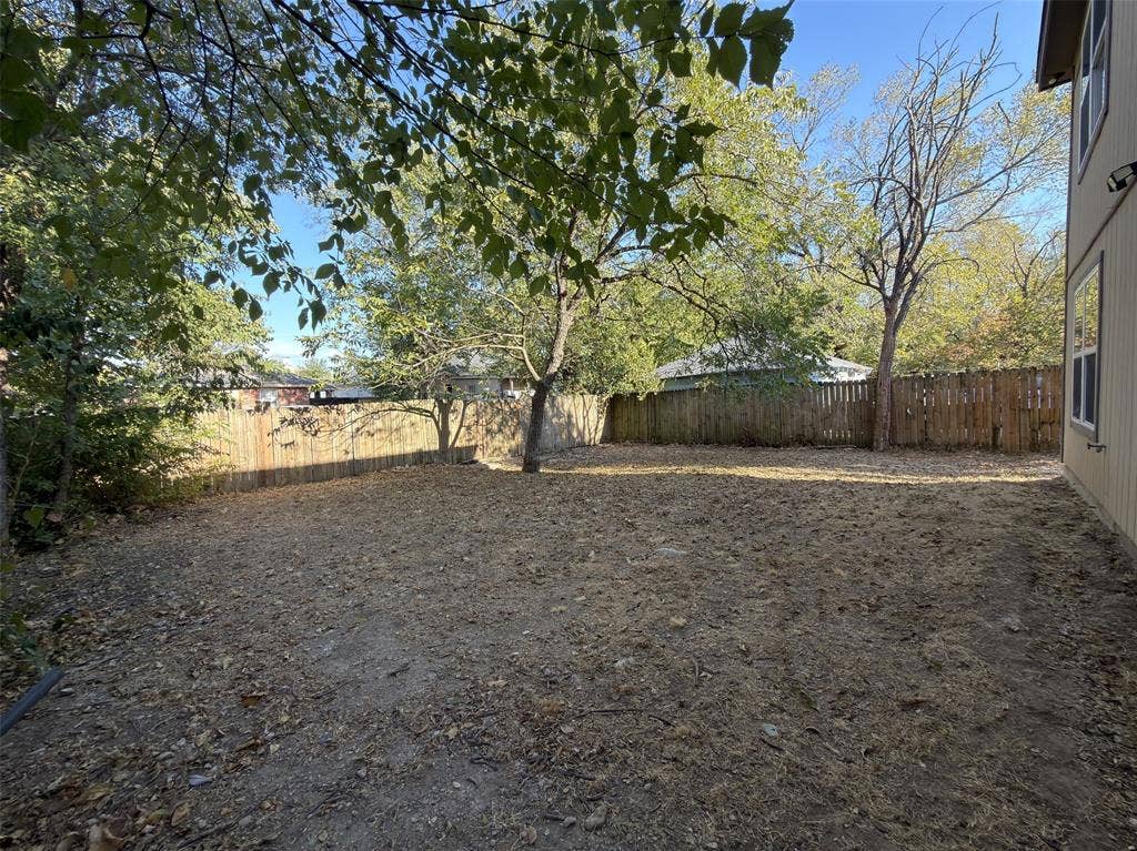 Large shared back yard ready for TLC.
