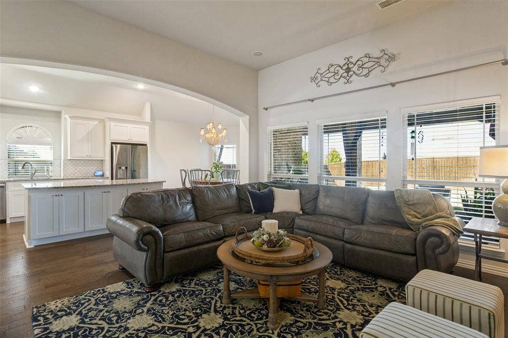 Open to kitchen, and a beautiful view of the yard.
