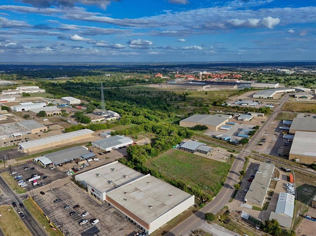 TBD Schroeder Drive, Waco, TX 76710 Industrial site featuring expansive warehouse structures, paved surface parking, dedicated loading docks, and direct access to municipal thoroughfares