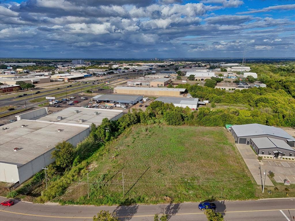TBD Schroeder Drive, Waco, TX 76710 Vacant lot featuring cleared terrain, proximity to established industrial infrastructure, and direct asphalt street frontage