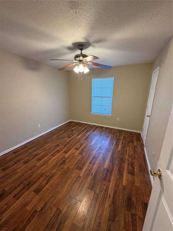 475 Perch Road, Rockwall, TX 75032 Interior space featuring wood-finish flooring, a neutral wall palette, a multi-blade ceiling fan with integrated lighting, and a single-hung window